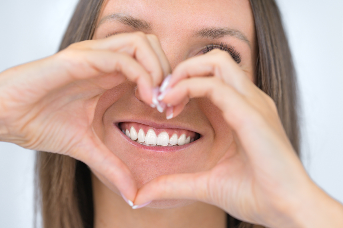 Teeth care. Woman with perfect smile with strong white teeth